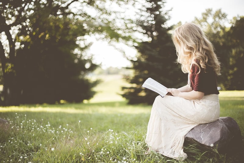 Woman reading book for relaxation